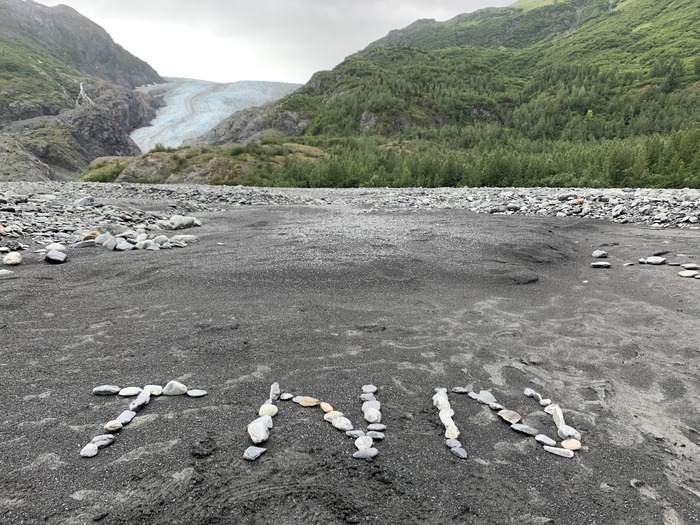 TNN written in stones in front of Exit Glacier